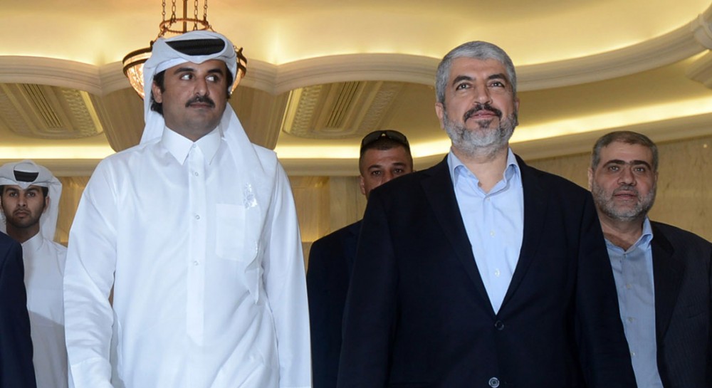 رئيس المكتب السياسي لحماس خالد مشعل وأمير قطر تميم بن حمد