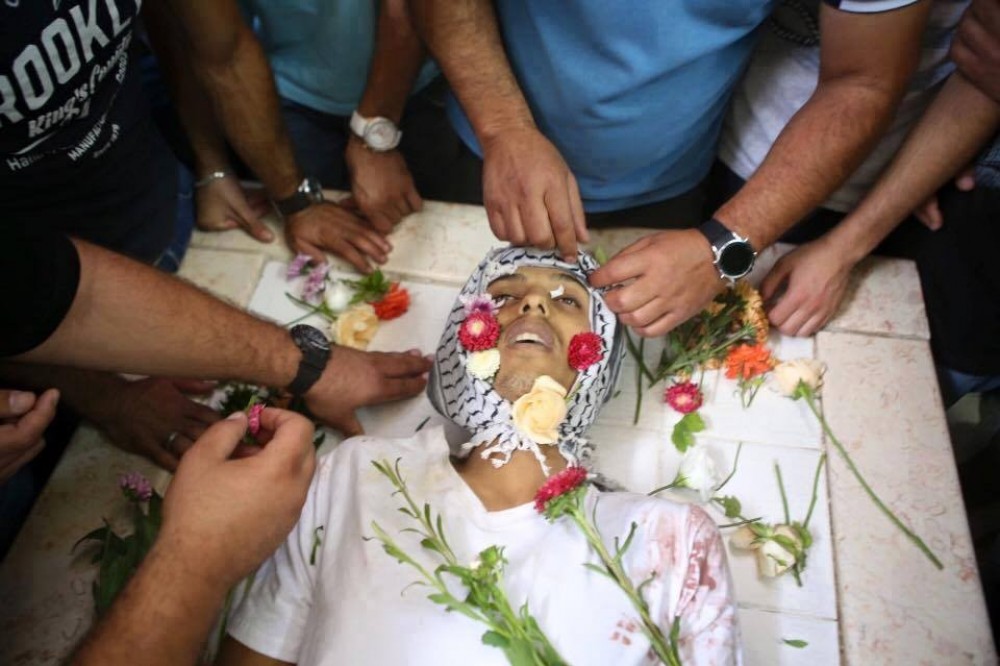 جثمان الشهيد محمد أبو لطيفة 