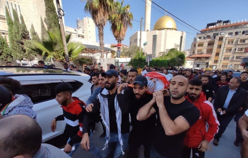 جانب من جنازة الشهيدين