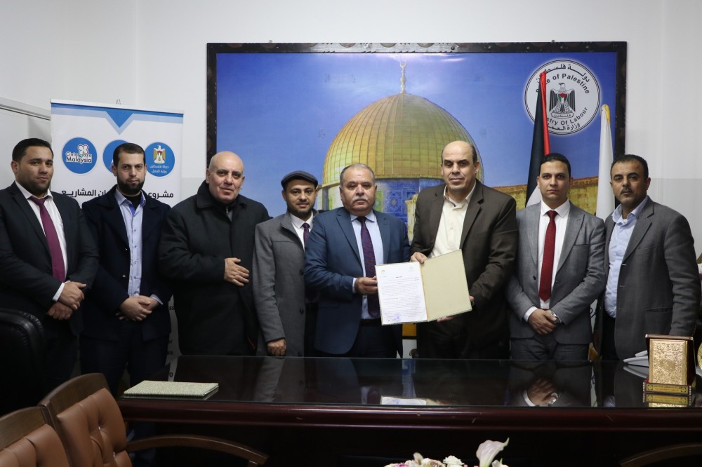 العمل والوطني الإسلامي يوقعان مذكرة تفاهم لإقراض صندوق جذور1