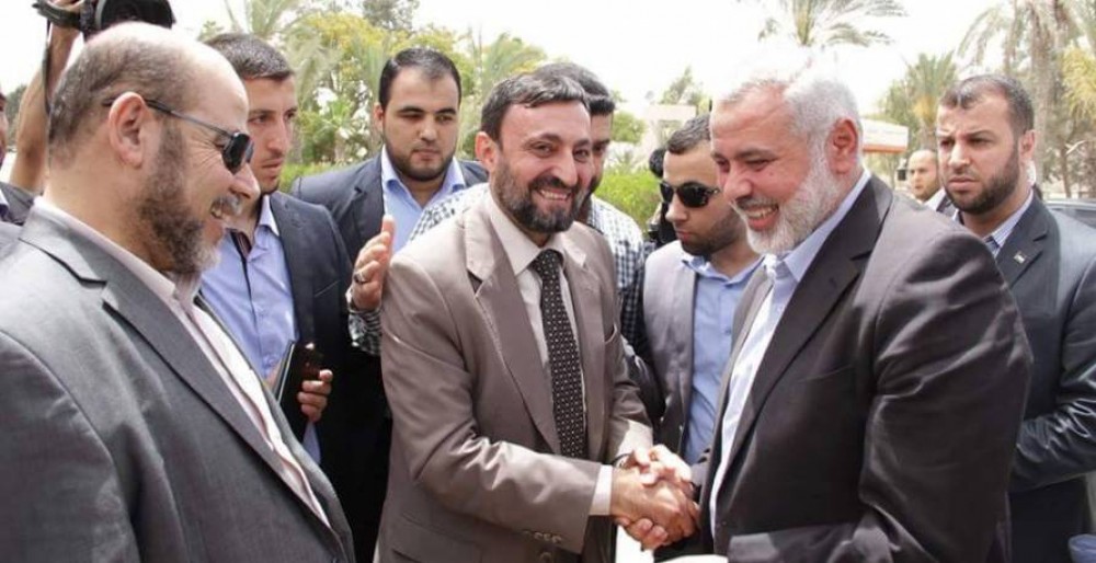 هنية باستقبال العلمي وأبو مرزوق 