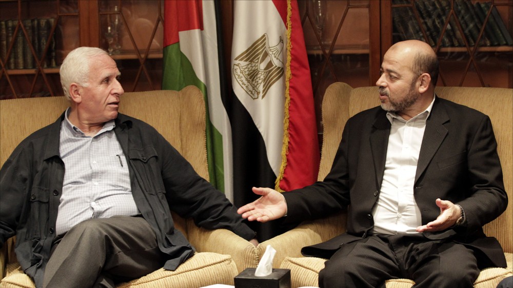 موسى أبو مرزوق وعزام الأحمد