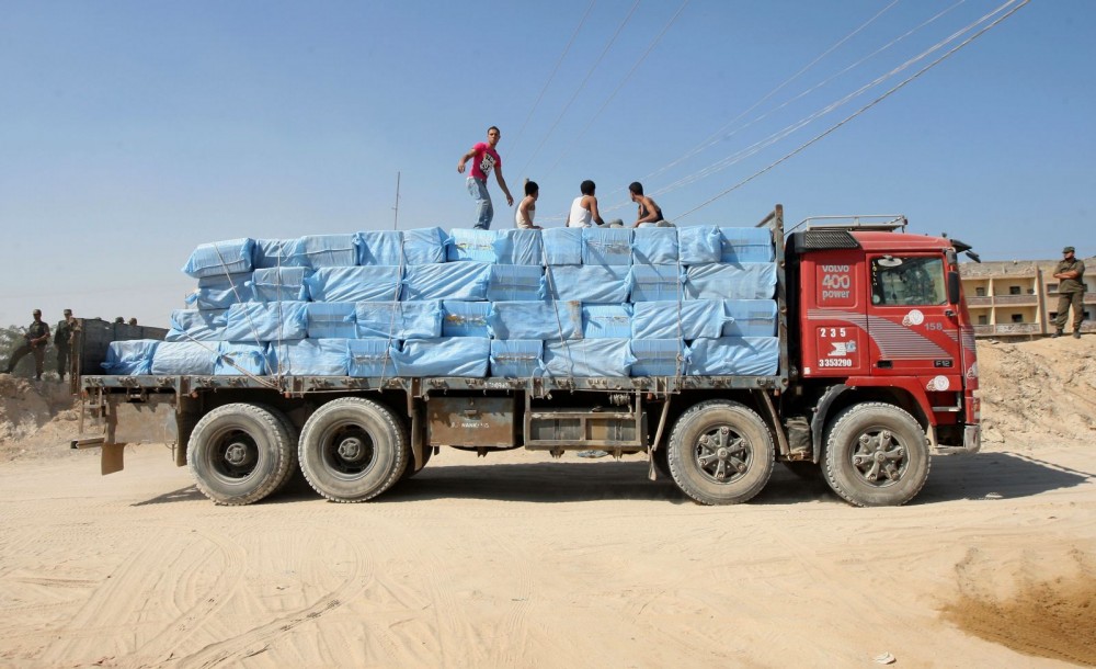 A-Palestinian-truck-carrying-goods-smuggled-through-tunnels-leaves-the-Gaza-Egypt-border-in-Rafah
