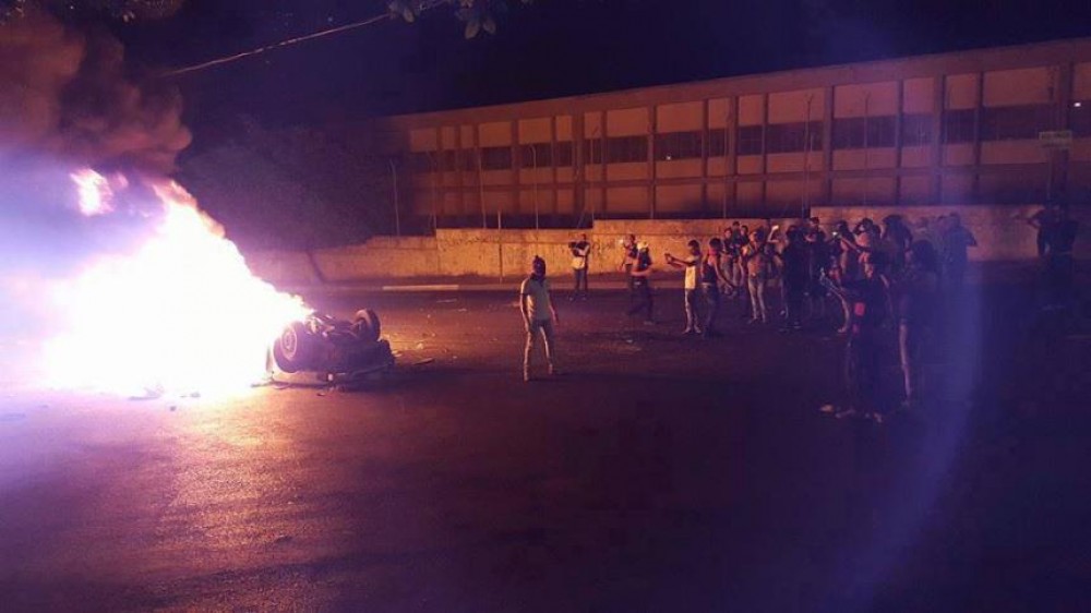 مركبة المستوطنين التي أحرقوها الشبان 