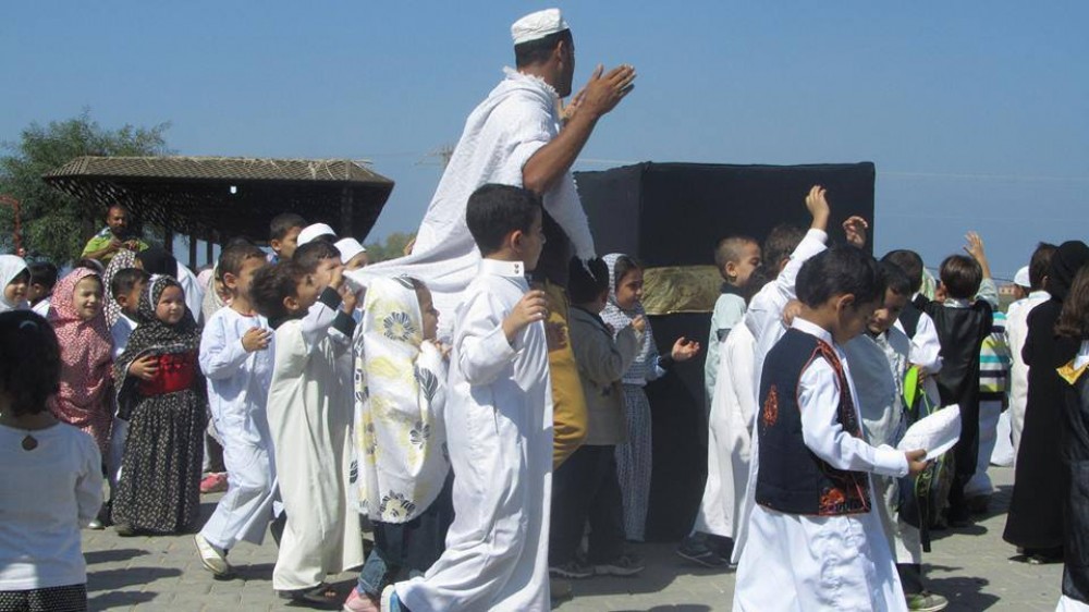 جانب من أداء الأطفال شعائر الحج 