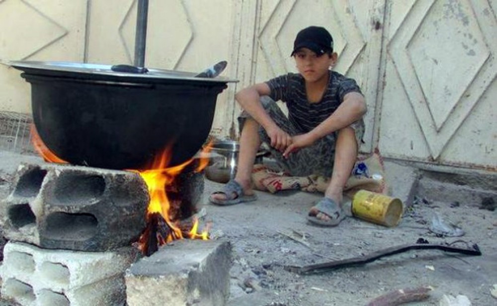 طفل فلسطيني بمخيم اليرموك 