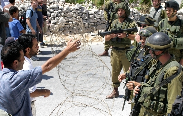 Israeli forces storm Russian Orthodox Church in Hebron, arrest citizen from Yatta