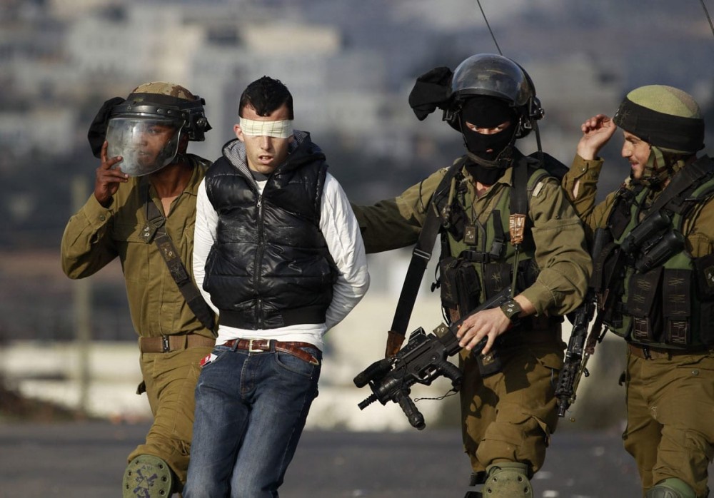 IOF detains 12 Palestinians in raids to occupied West Bank, Jerusalem
