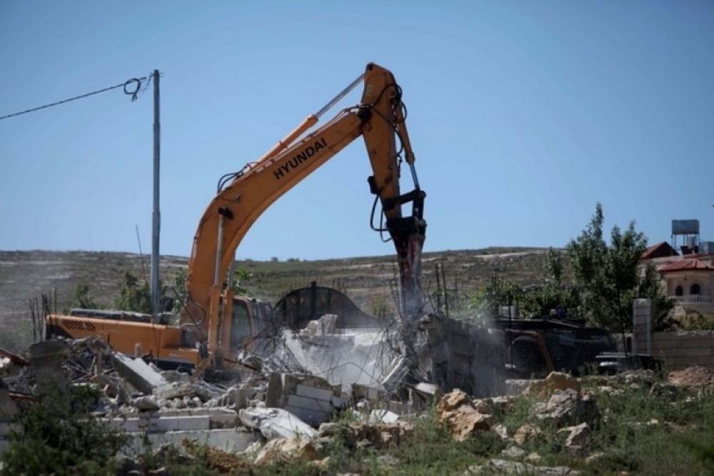 IOF demolishes two Palestinian homes, five facilities in occupied Jerusalem