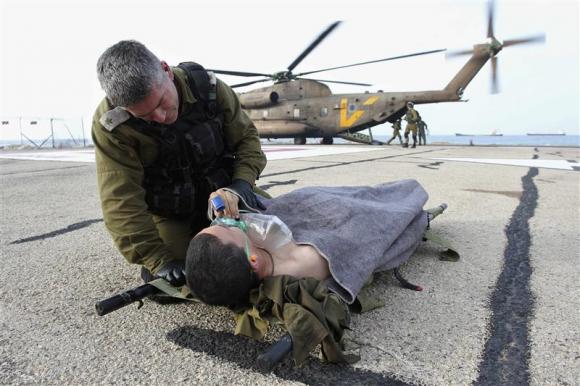 Four Israeli troops hurt in Golan blast, Israel blames Syria