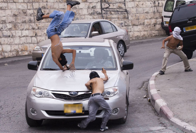 Israeli settlers run over two Palestinians in West Bank