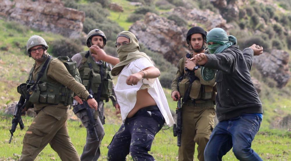 Israeli occupation settlers attack Ramallah village, torch farmland