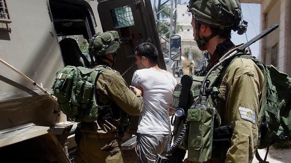 IOF detains 11 Palestinians in raids across occupied West Bank