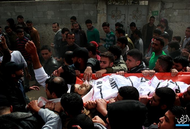 Palestinians during the funeral service of two Palestinians killed in an airstrike (March 4, )