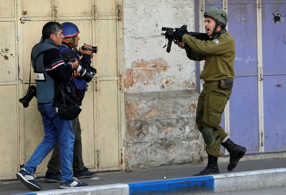 Report: 99 Israeli violations against Palestinian journalists in November