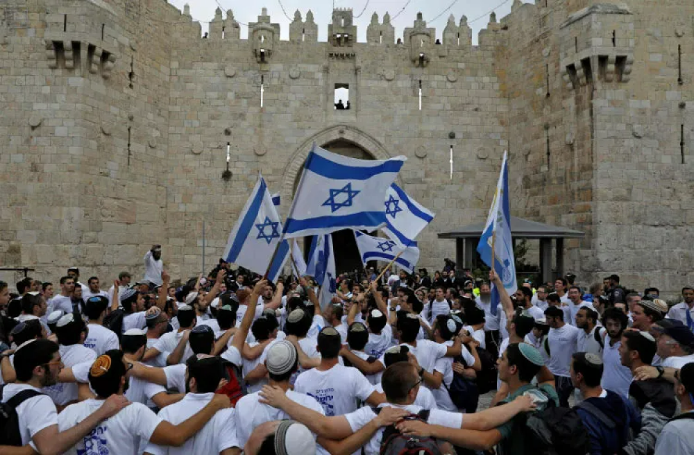 Israeli cabinet votes to allow flag march next Tuesday