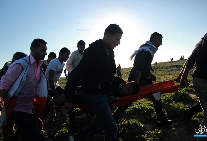 Two Palestinians injured in border protest on Frday, March 21, 2014